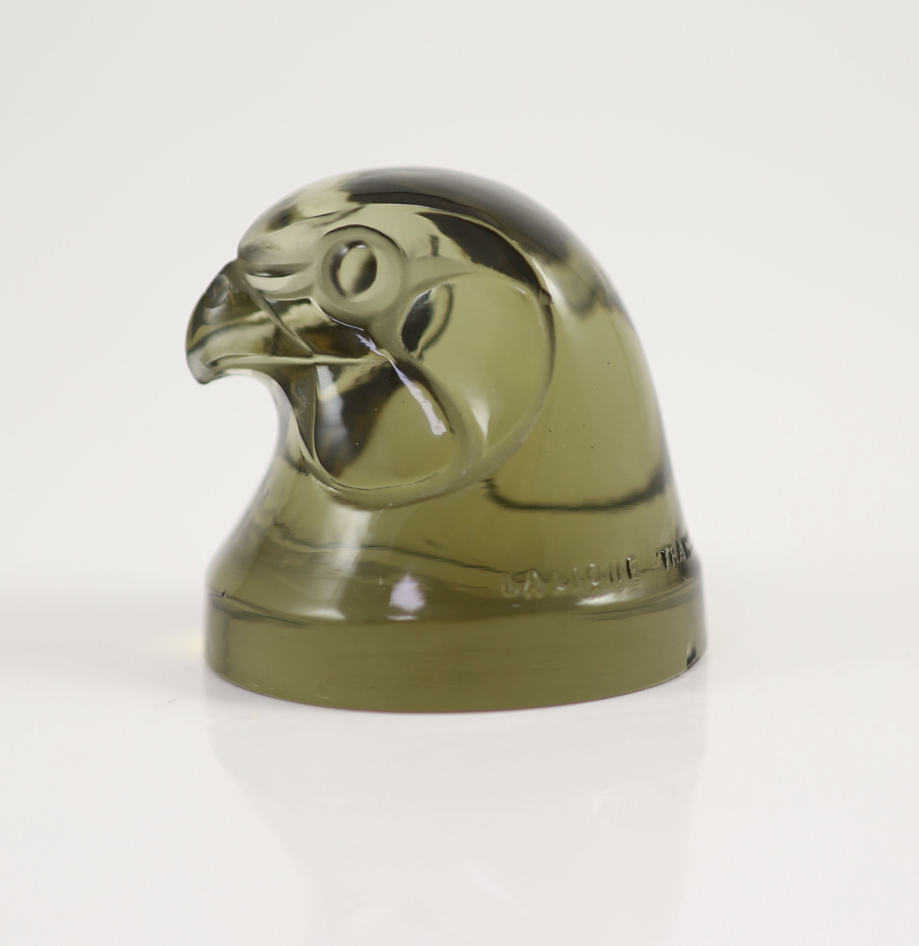 A Lalique 'Tete D'Epervier' topaz glass car mascot, 6.5 cm high